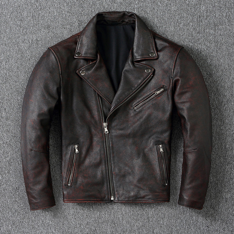 Brown leather jacket with zippers on a gray background