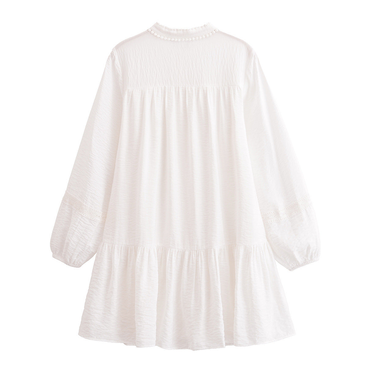 White dress with long sleeves on a white background