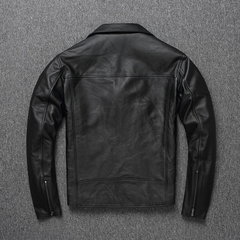 Black leather jacket on a textured gray background