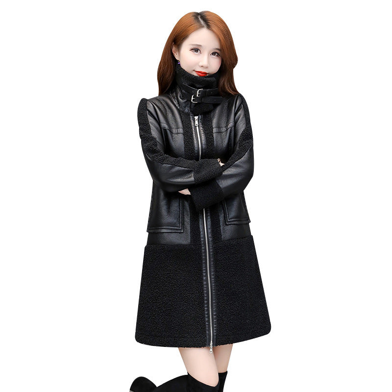 Woman wearing a black leather jacket with a white background